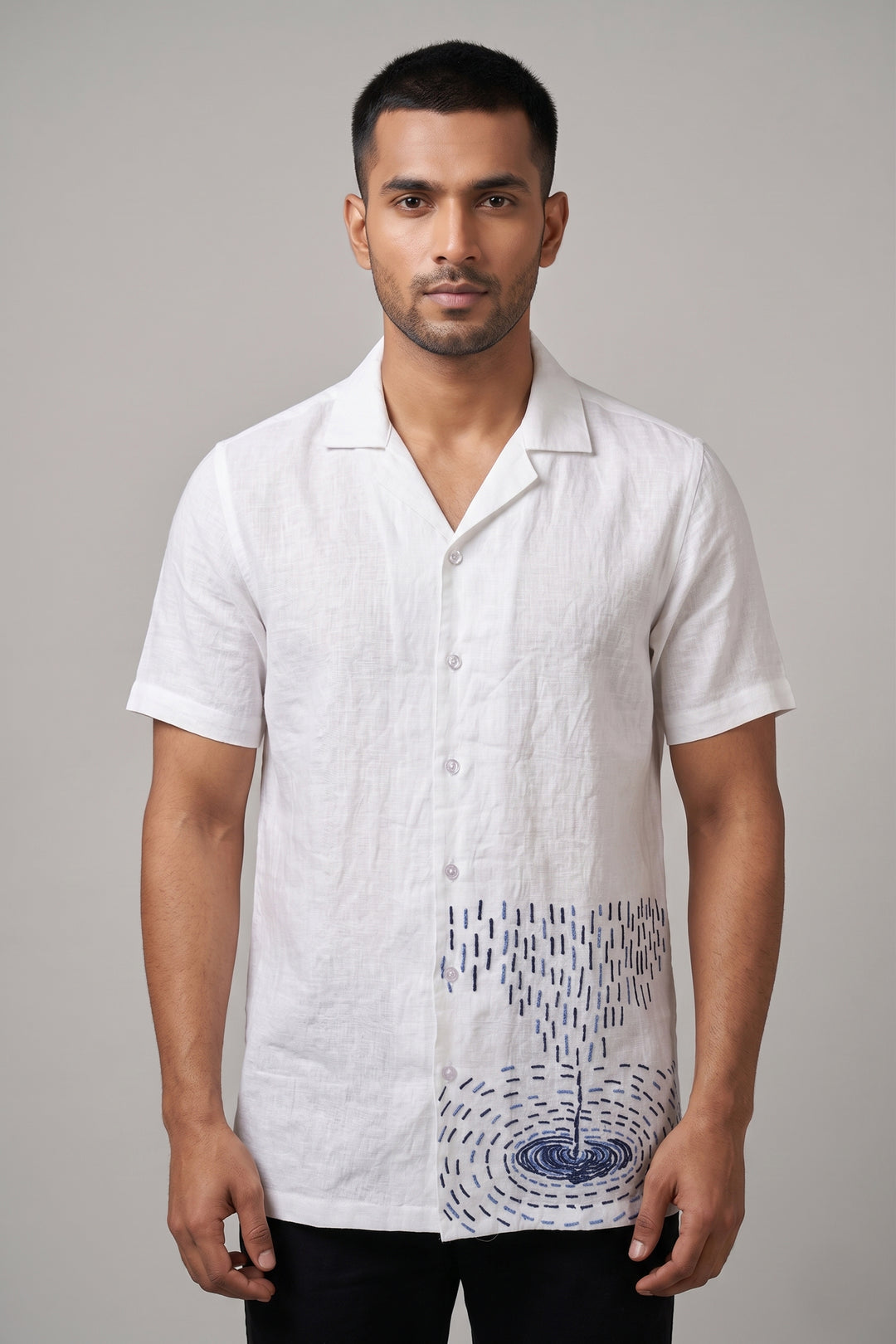 White linen shirt with artisan thread embroidery — rain and ripple motifs — Nivra by HILO DESIGN