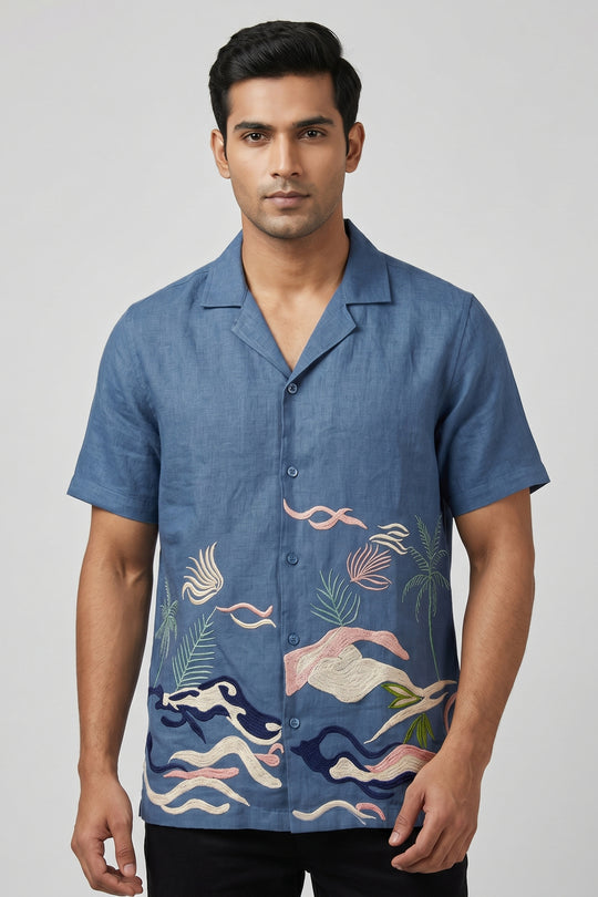 Deep blue linen shirt with artisan thread ocean and palm embroidery — Mirage by HILO DESIGN
