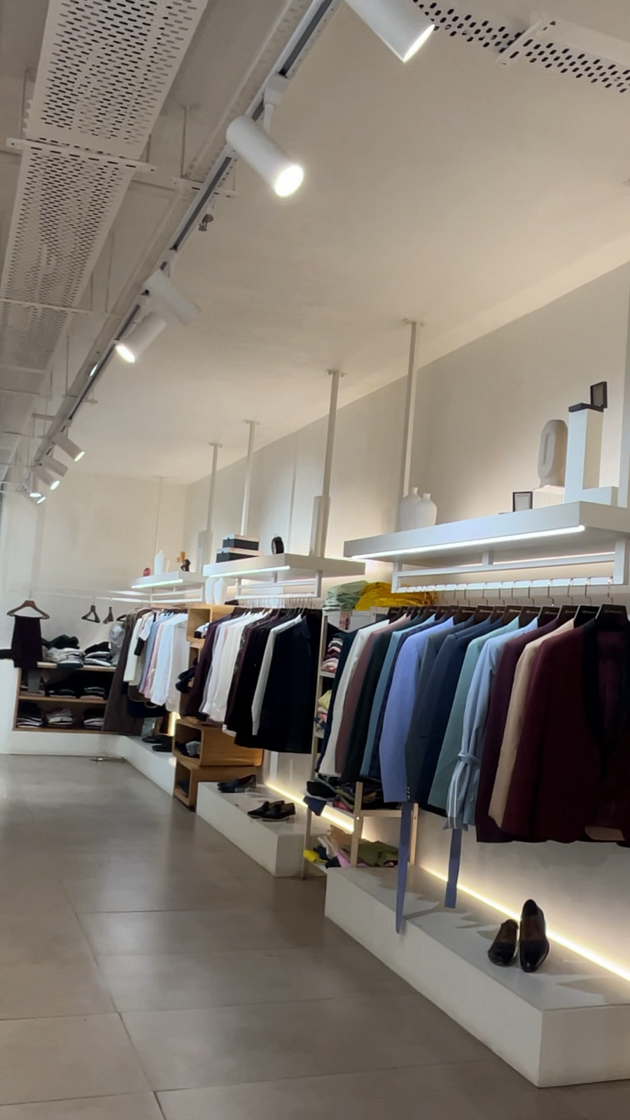 Blazer and shirt racks at the Hilo Design store