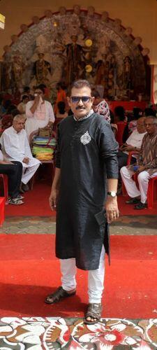 HILO DESIGN customer in the Amyr black embroidered kurta at a Durga Puja pandal
