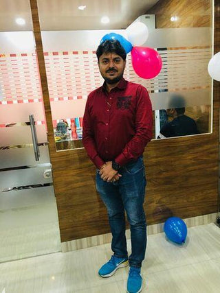 HILO DESIGN customer Avinash Singh in a maroon shirt